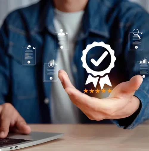 Close up of quality assurance icon above a business professional’s hand symbolizing LED display reliability