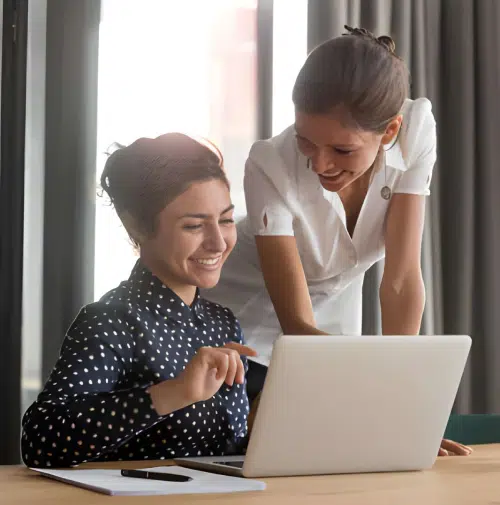 Support representative assisting a client with LED display solutions on a laptop