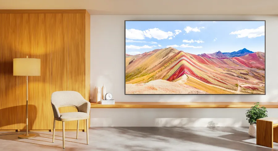 Indoor LED video wall installed in a modern living room displaying scenic landscape visuals